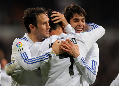 Cristiano Ronaldo hugging Ricardo Carvalho and Ricardo Kaká