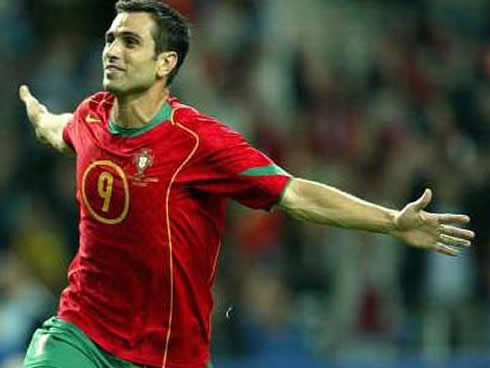 Pedro Pauleta celebrating a goal with arms wide open for Portugal