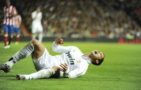 Cristiano Ronaldo hurted, wounded and injured on the ground, against Atletico Madrid