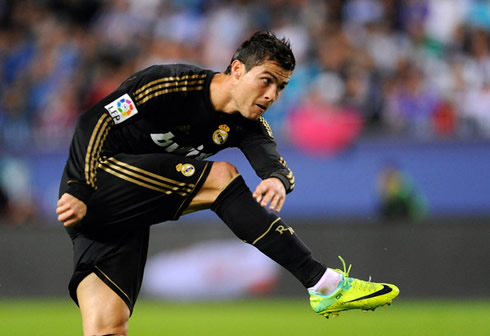 Cristiano Ronaldo shooting and striking the ball in Real Madrid