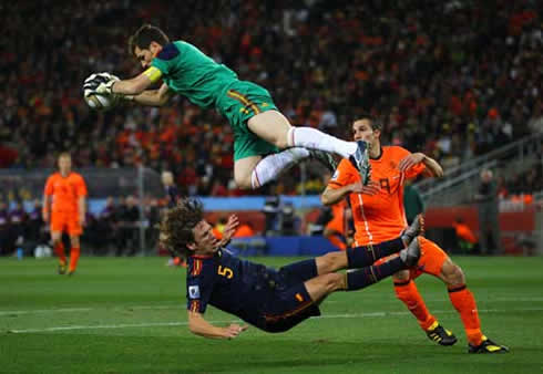 Iker Casillas jumping over Carles Puyol in the 2010 World Cup final, Spain vs Netherlands