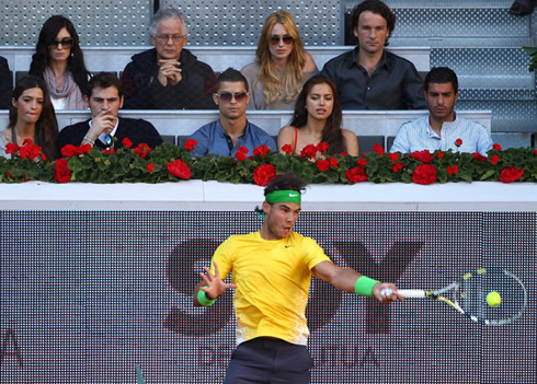 Cristiano Ronaldo, Irina Shayk, Casillas and Sara Carbonero, all watching Rafael Nadal in a tennis game