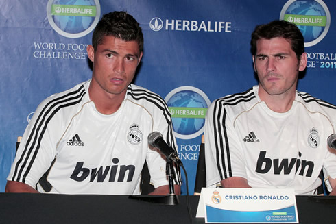 Cristiano Ronaldo talking in a press conference, with Iker Casillas listening
