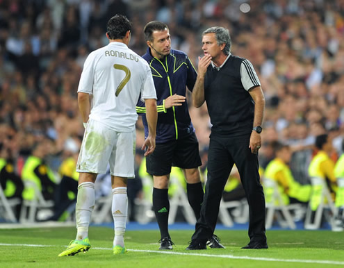 José Mourinho giving Cristiano Ronaldo some tactical instructions