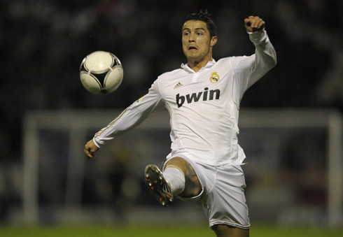 Cristiano Ronaldo great effort to reach a ball, during the Copa del Rey match against Ponferradina, in 2011-2012
