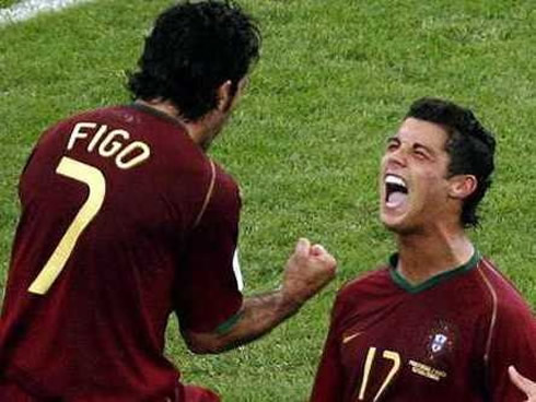 Cristiano Ronaldo and Luís Figo celebrating a goal for Portugal