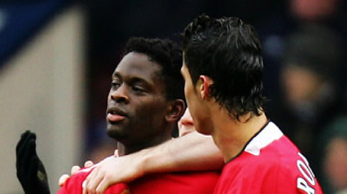 Cristiano Ronaldo celebrating a goal with Louis Saha, in Man Utd