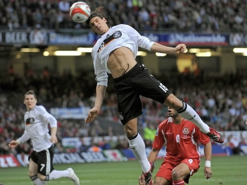 Mario Gomez heading the ball, when playing for Germany