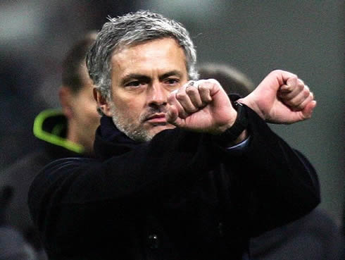José Mourinho with his hands tied, making a gesture