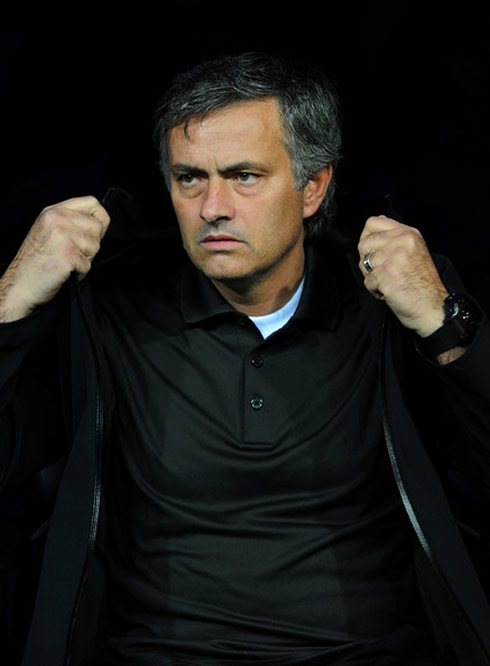 José Mourinho wearing a black shirt and black jacket