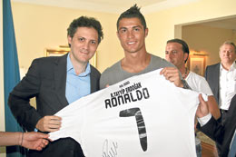 Cristiano Ronaldo offering his Real Madrid shirt number 7