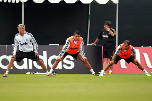 Fábio Coentrão, Cristiano Ronaldo and Ricardo Carvalho stretching in Real Madrid training