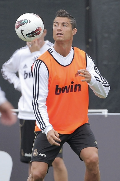 Cristiano Ronaldo touching the ball with this shoulder