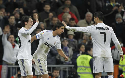 Cristiano Ronaldo celebrating with Ozil and Khedira