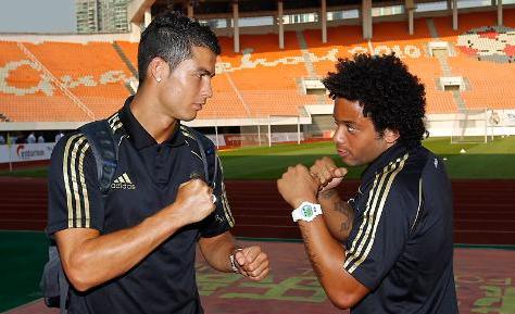 Cristiano Ronaldo and Marcelo on a fighting pose in China
