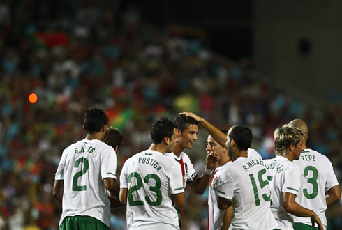 Cristiano Ronaldo celebrates with his team mates