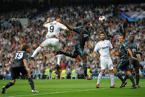 Cristiano Ronaldo heading a ball in the UEFA Champions League against Marseille