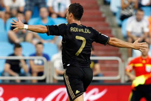 Cristiano Ronaldo running and celebrating with arms wide open