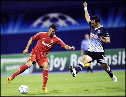 Cristiano Ronaldo playing against Dinamo Zagreb in the UEFA Champions League 2011-12, wearing the new Real Madrid red jersey