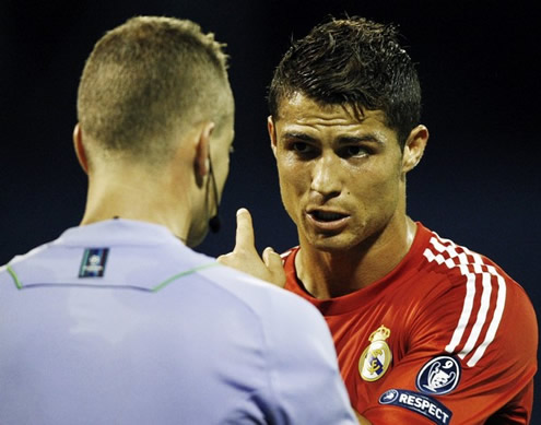 Cristiano Ronaldo complains at the referee, asking if he saw the tackle he just had suffered a few minutes ago, that made him start bleeding from his ankle