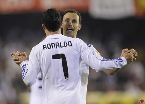 Cristiano Ronaldo holding hands with Ricardo Carvalho