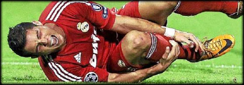 Cristiano Ronaldo hurt and in pain after suffering a tackle