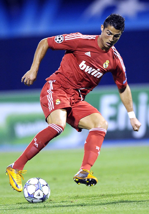 Cristiano Ronaldo in action with the Real Madrid red jersey 2011-2012, in the UEFA Champions League