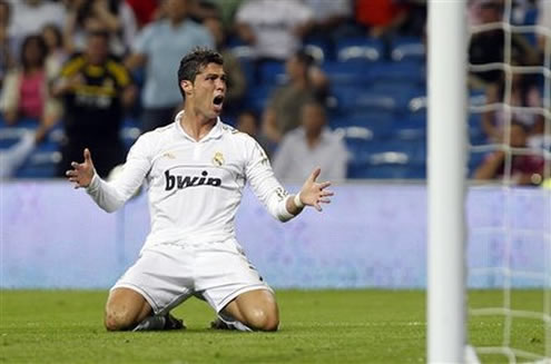 Cristiano Ronaldo on his knees screaming and looking at the crowd and fans in La Liga 2011-2012