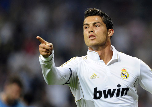 Cristiano Ronaldo pointing at someone, giving credit to one of his teammates for the goal he just scored in the UCL 2011/2012