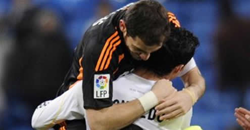 Iker Casillas jumping to Cristiano Ronaldo lap to celebrate a win in Real Madrid 2010-2011