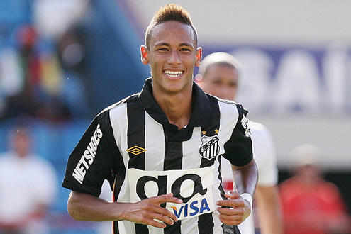 Neymar looking happy while running in a match for Santos FC, in Brazil