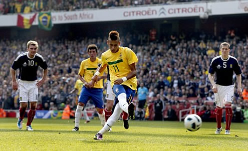 Neymar playing for Brazil against Scotland and scoring a goal from the penalty kick spot