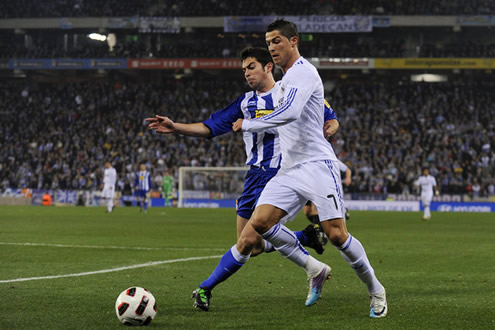 Cristiano Ronaldo passing over some Espanyol defender