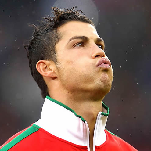 Cristiano Ronaldo exchales as he focus on the match