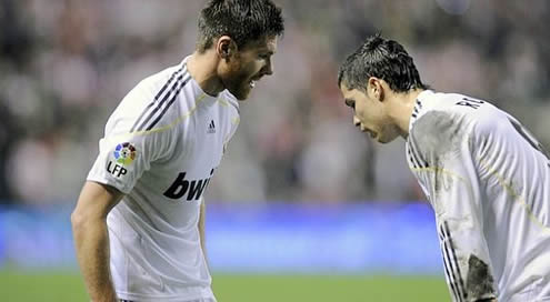 Xabi Alonso and Cristiano Ronaldo argue and discuss about who should take the free-kick in Real Madrid