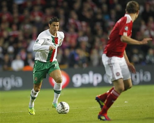 Cristiano Ronaldo running with the ball against Denmark, in the Euro 2012 Qualifiers