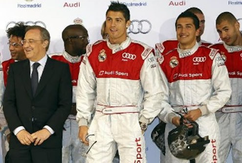 Cristiano Ronaldo and Nuri Sahin standing together in a Real Madrid/Audi event