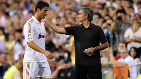 Cristiano Ronaldo being substituted by José Mourinho, in a Real Madrid game 2011-2012