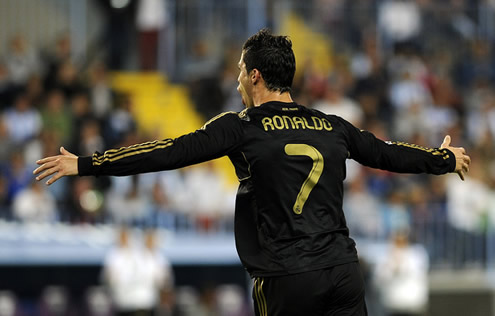 Cristiano Ronaldo running with the mouth open as he scored an hat-trick against Malaga in La Liga 2011-2012