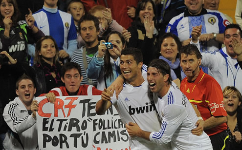 Sergio Ramos and Cristiano Ronaldo smiling and very happy after another Real Madrid in La Liga against Espanyol de Barcelona