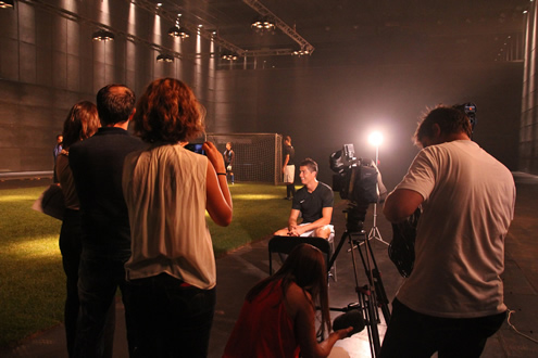Cristiano Ronaldo sits down with the spotlights turned to him, while he grants an interview in BES commercial (Banco Espírito Santo)