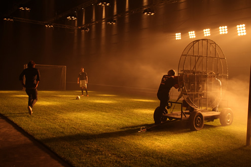 Cristiano Ronaldo about to shoot the ball while everyone prepare the set