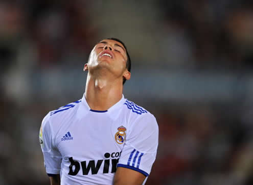 Cristiano Ronaldo closes his eyes and puts sends his head back