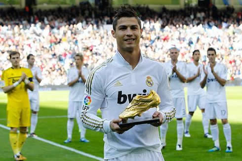 Cristiano Ronaldo presenting and showing his Golden Shoe (Boot) award for Real Madrid fans and supporters, at the Santiago Bernabéu, before the match against Osasuna in La Liga 2011-12