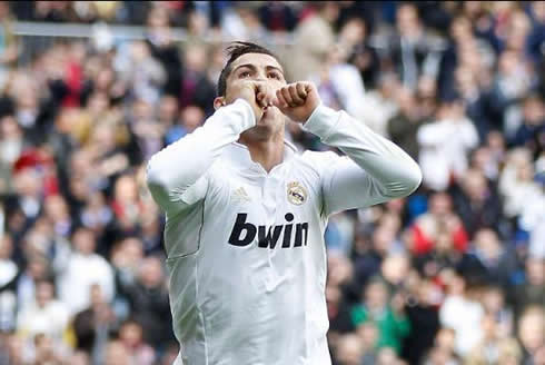 Cristiano Ronaldo putting his fingers in his mouth to celebrate and dedicate a goal to his son, Cristiano Ronaldo Jr.